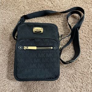 Michael Kors Black Messenger Bag with Gold Accents